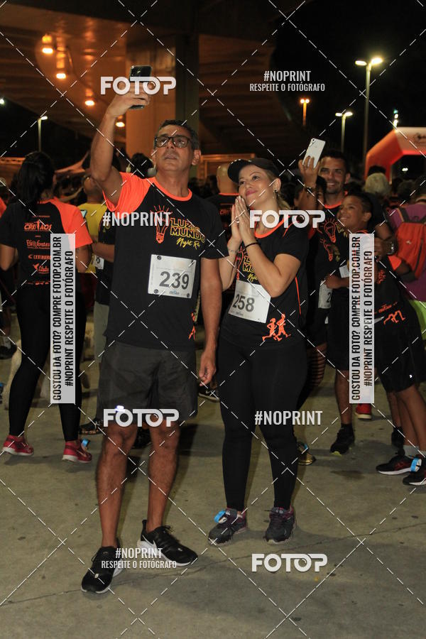 Buy your photos of the eventLuz do Mundo Night Run on Fotop