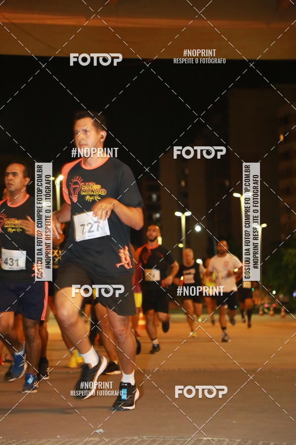Buy your photos of the eventLuz do Mundo Night Run on Fotop