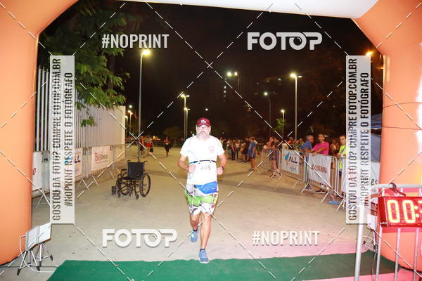 Buy your photos of the eventLuz do Mundo Night Run on Fotop