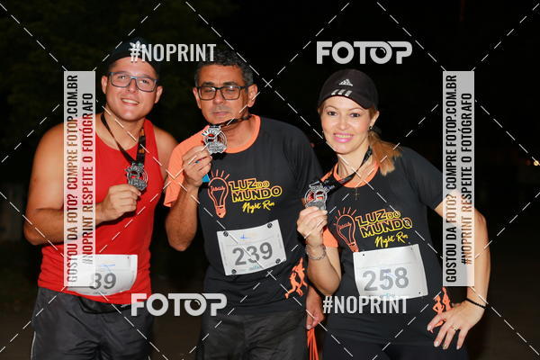 Buy your photos of the eventLuz do Mundo Night Run on Fotop