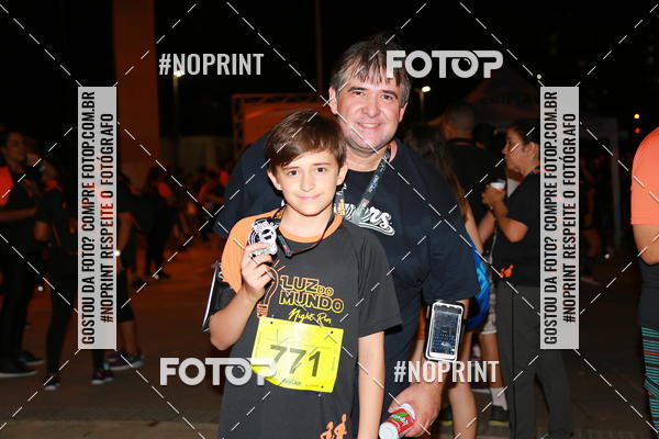 Buy your photos of the eventLuz do Mundo Night Run on Fotop