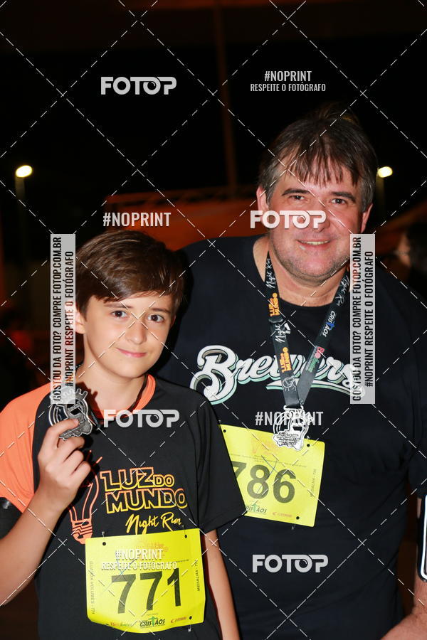 Buy your photos of the eventLuz do Mundo Night Run on Fotop