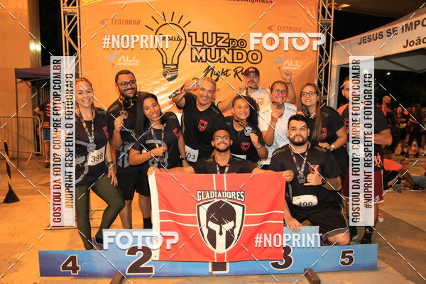 Buy your photos of the eventLuz do Mundo Night Run on Fotop