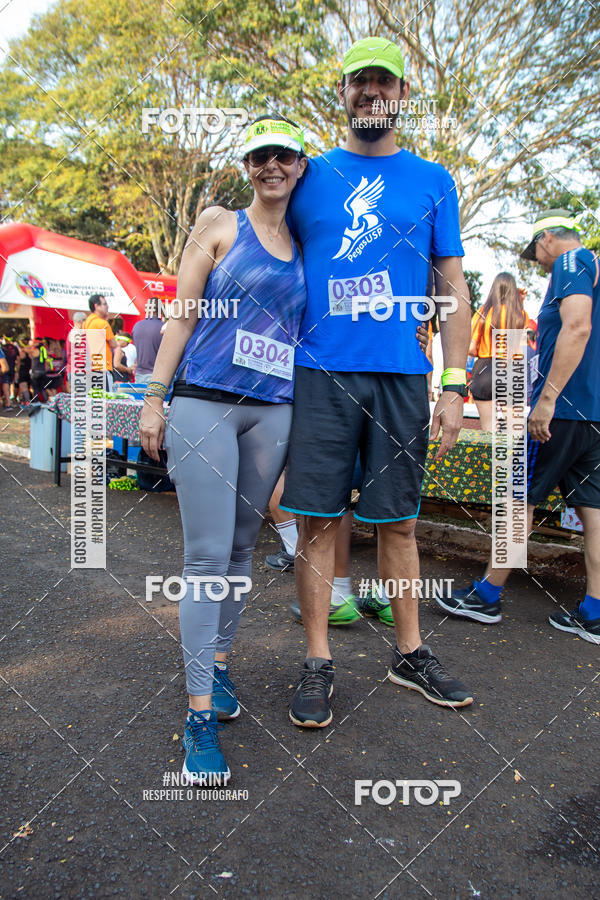 Buy your photos of the event6 Corrida Solidria Moura Lacerda on Fotop