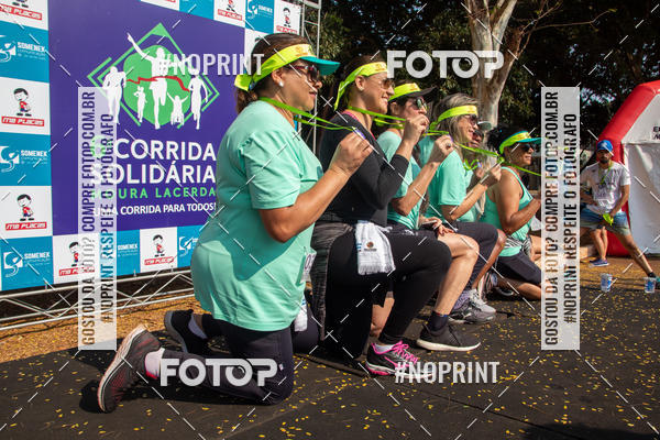 Buy your photos of the event6 Corrida Solidria Moura Lacerda on Fotop