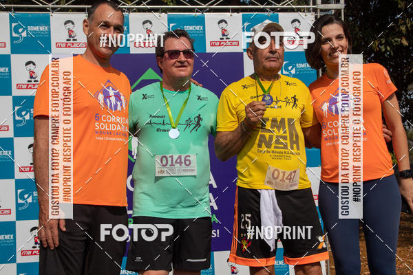 Buy your photos of the event6 Corrida Solidria Moura Lacerda on Fotop