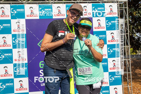 Buy your photos of the event6 Corrida Solidria Moura Lacerda on Fotop