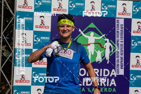 Buy your photos of the event6 Corrida Solidria Moura Lacerda on Fotop