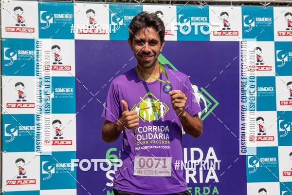 Buy your photos of the event6 Corrida Solidria Moura Lacerda on Fotop