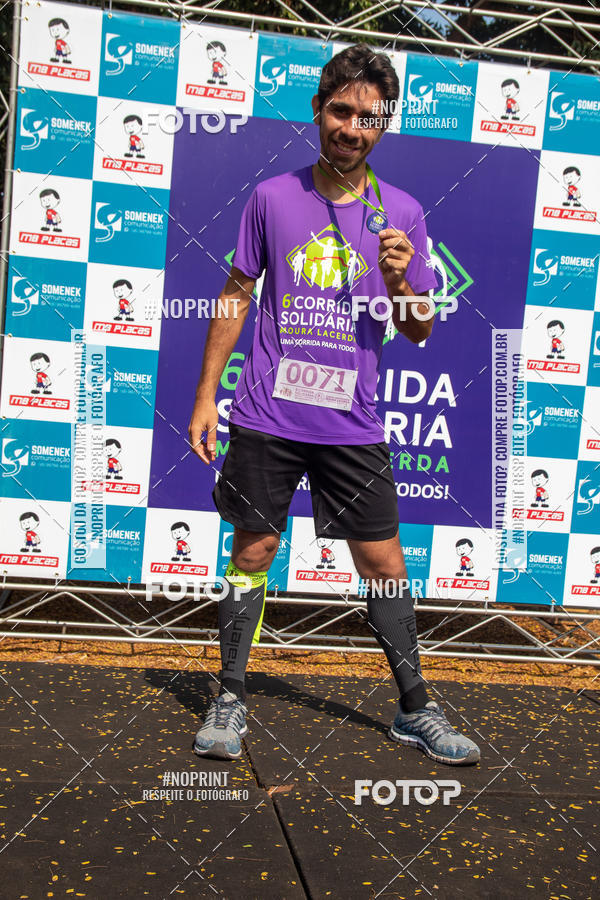 Buy your photos of the event6 Corrida Solidria Moura Lacerda on Fotop