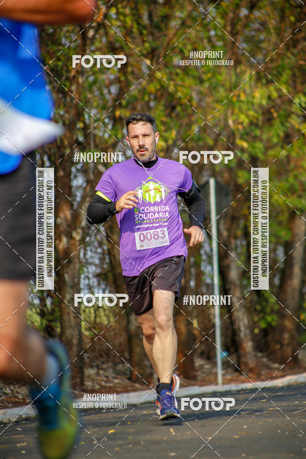 Buy your photos of the event6 Corrida Solidria Moura Lacerda on Fotop