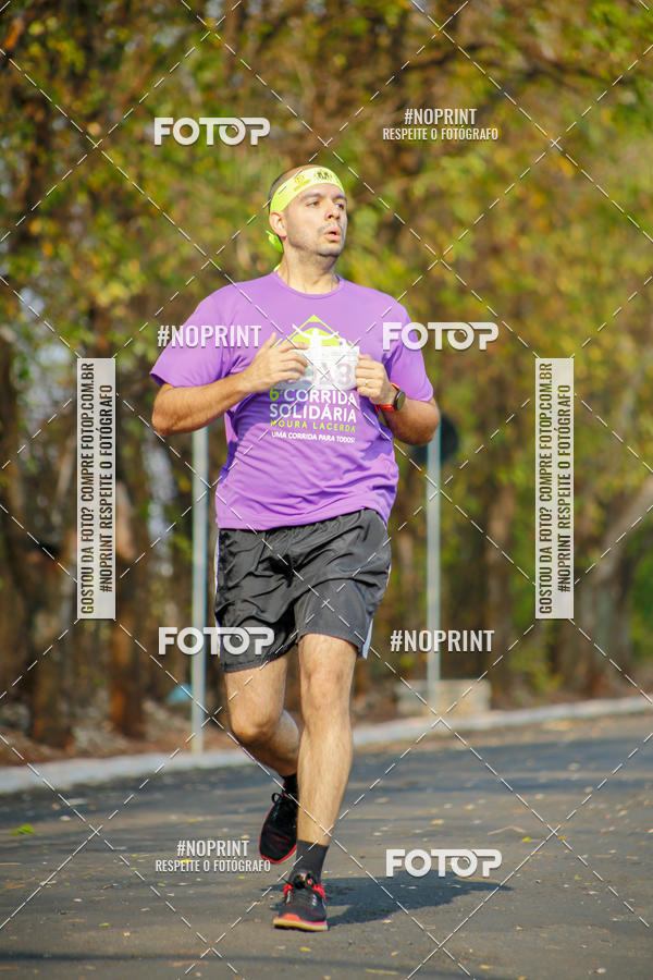 Buy your photos of the event6 Corrida Solidria Moura Lacerda on Fotop