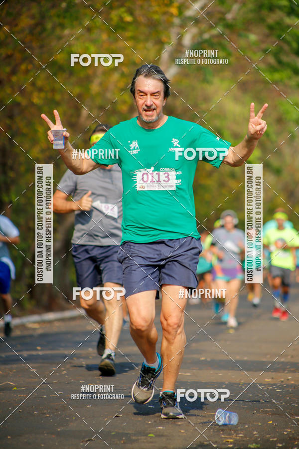 Buy your photos of the event6 Corrida Solidria Moura Lacerda on Fotop