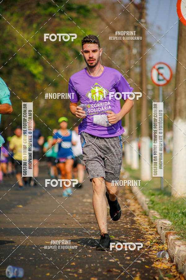 Buy your photos of the event6 Corrida Solidria Moura Lacerda on Fotop