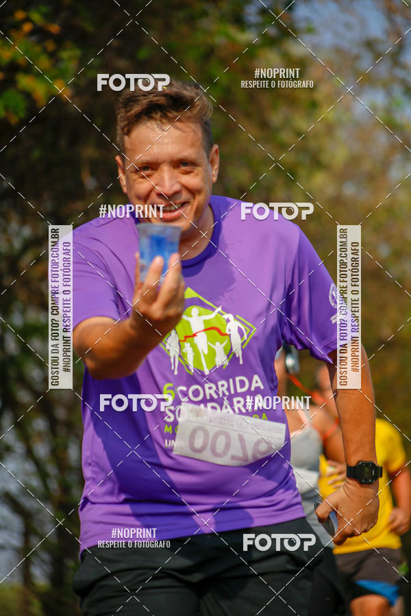Buy your photos of the event6 Corrida Solidria Moura Lacerda on Fotop