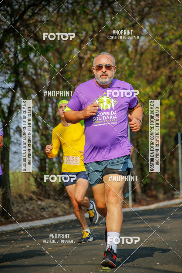 Buy your photos of the event6 Corrida Solidria Moura Lacerda on Fotop