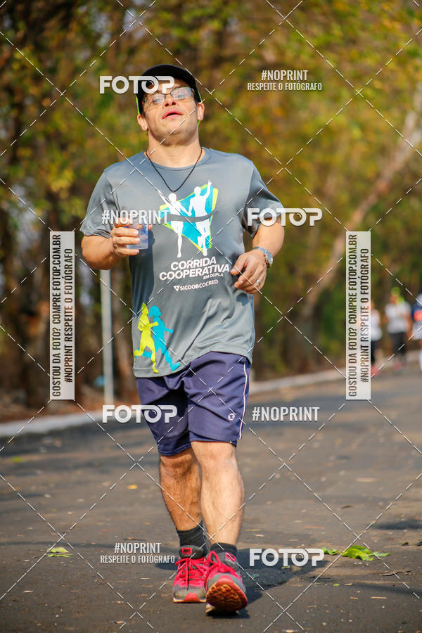 Buy your photos of the event6 Corrida Solidria Moura Lacerda on Fotop