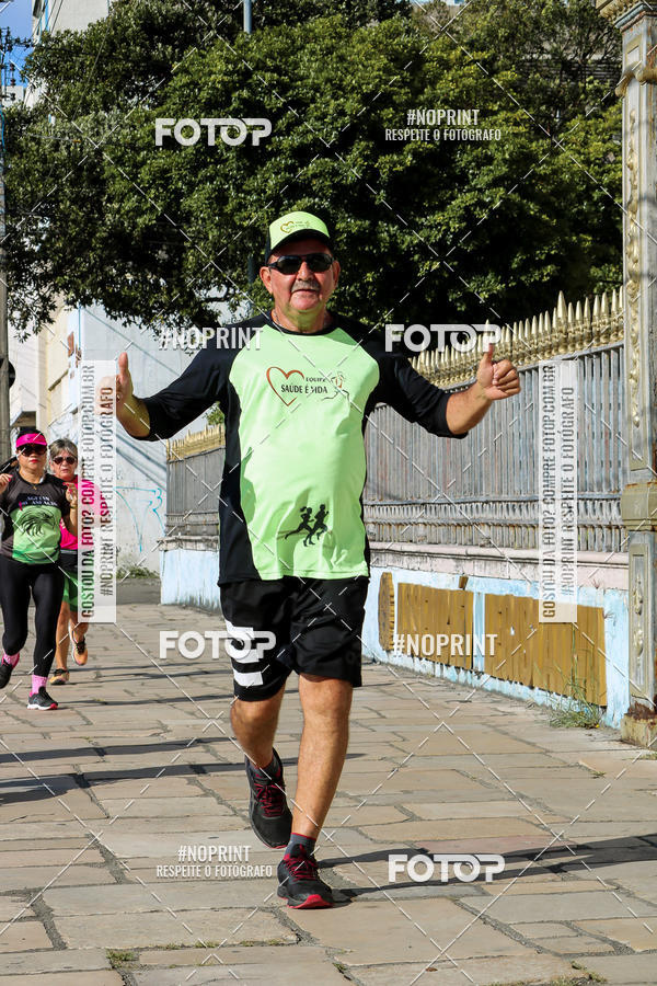 Buy your photos of the eventCorrida e Caminhada Outubro Rosa on Fotop
