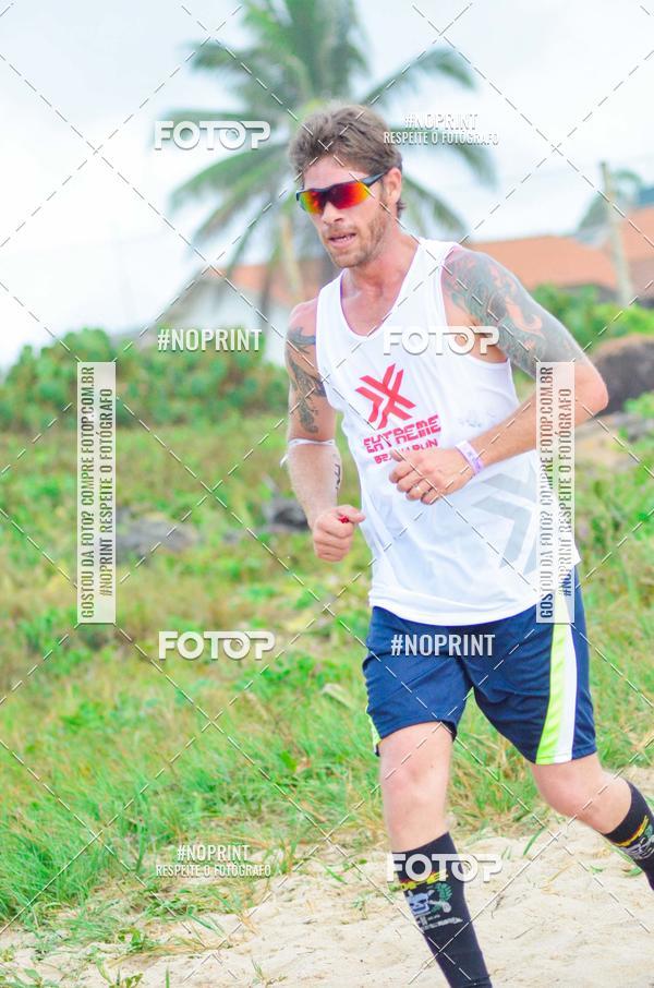 Achetez vos photos de l'vnementEXTREME BEACH RUN sur Fotop