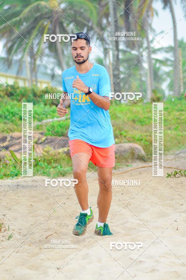 Achetez vos photos de l'vnementEXTREME BEACH RUN sur Fotop