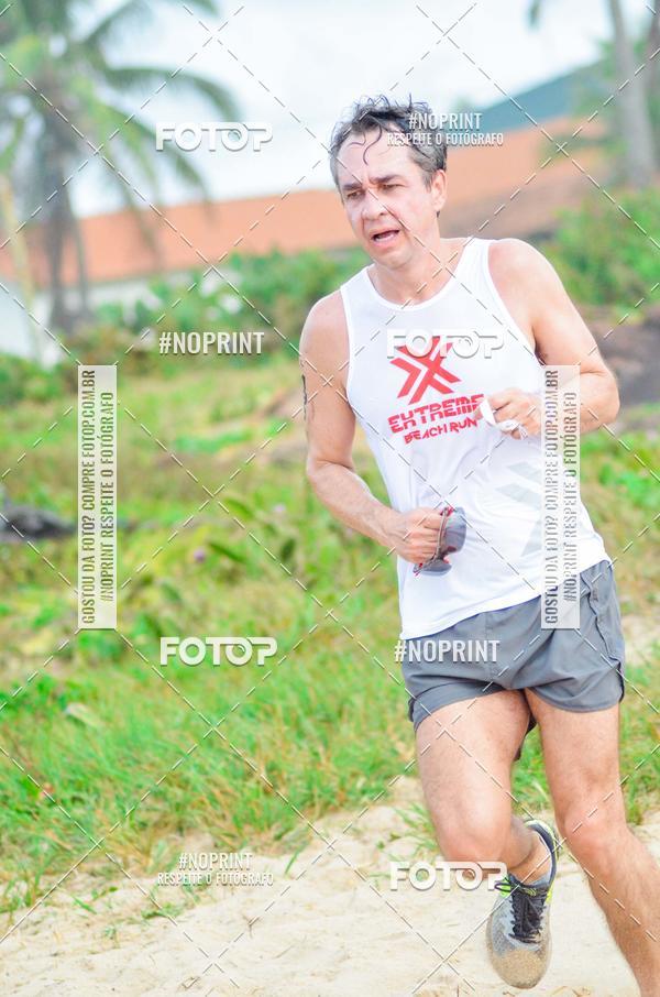 Achetez vos photos de l'vnementEXTREME BEACH RUN sur Fotop