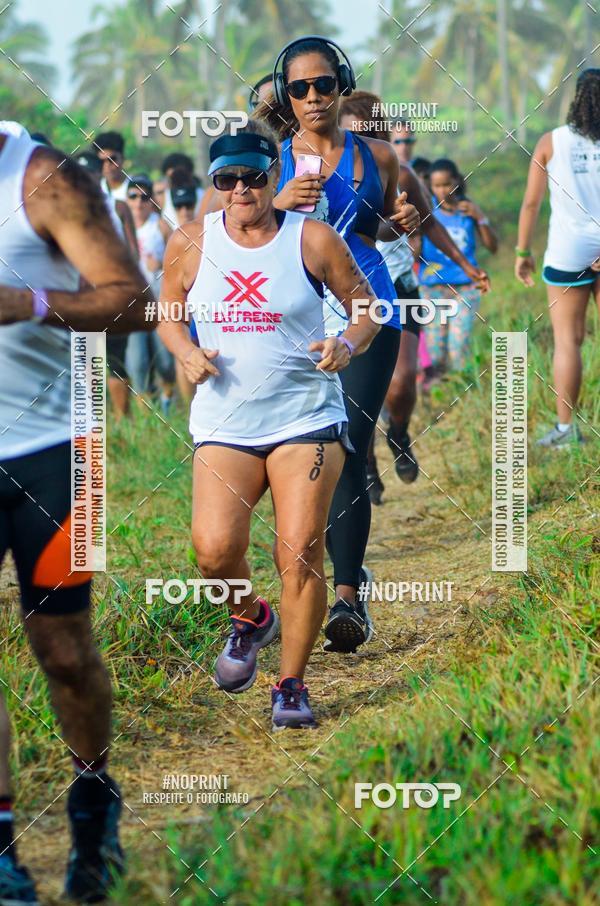 Achetez vos photos de l'vnementEXTREME BEACH RUN sur Fotop