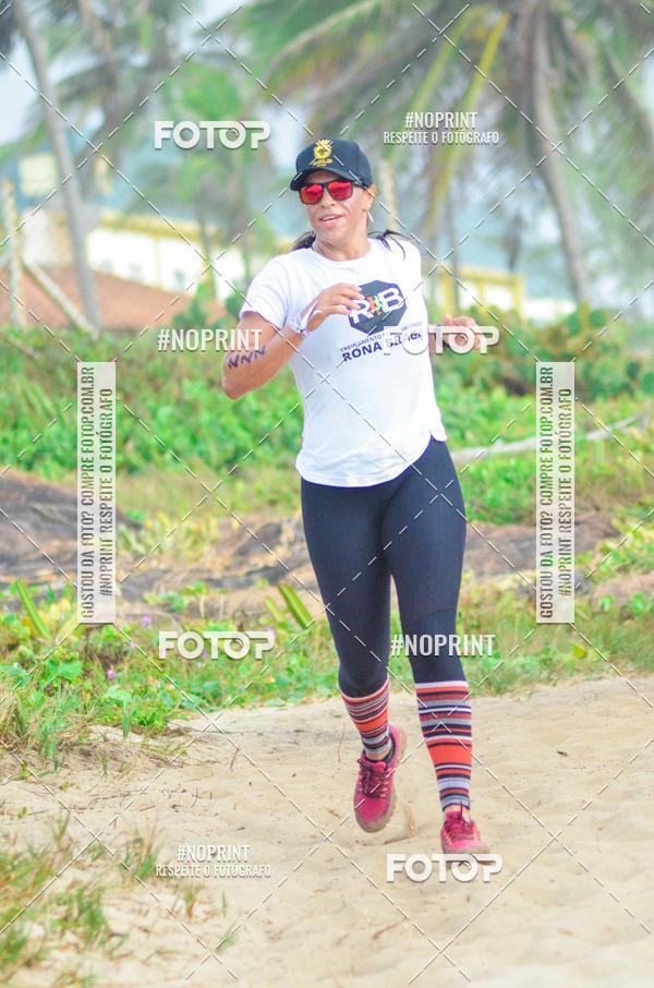 Achetez vos photos de l'vnementEXTREME BEACH RUN sur Fotop
