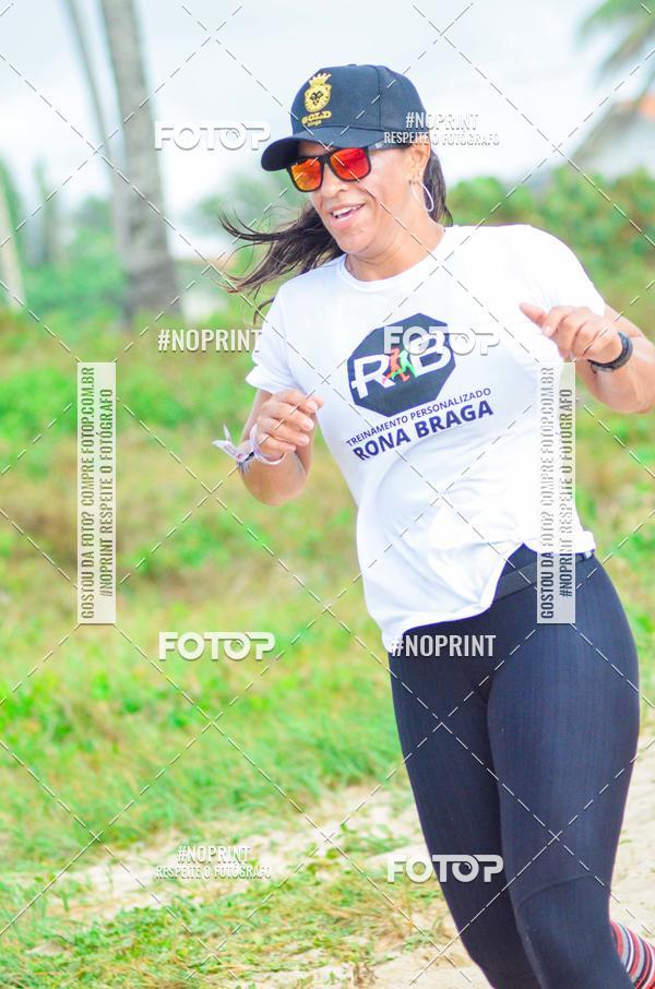 Achetez vos photos de l'vnementEXTREME BEACH RUN sur Fotop