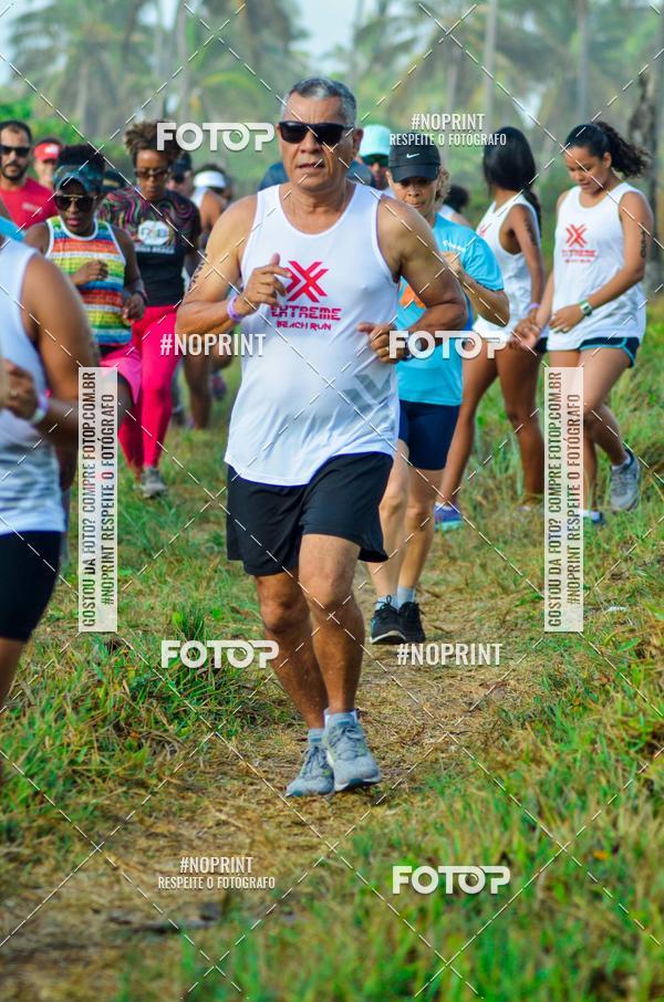 Achetez vos photos de l'vnementEXTREME BEACH RUN sur Fotop