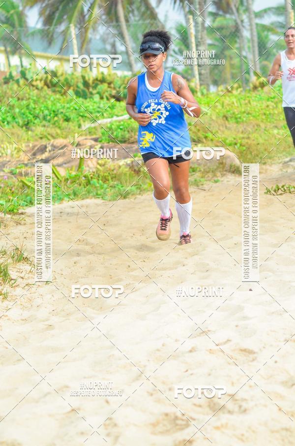 Achetez vos photos de l'vnementEXTREME BEACH RUN sur Fotop