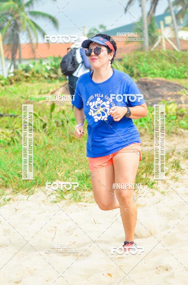 Achetez vos photos de l'vnementEXTREME BEACH RUN sur Fotop