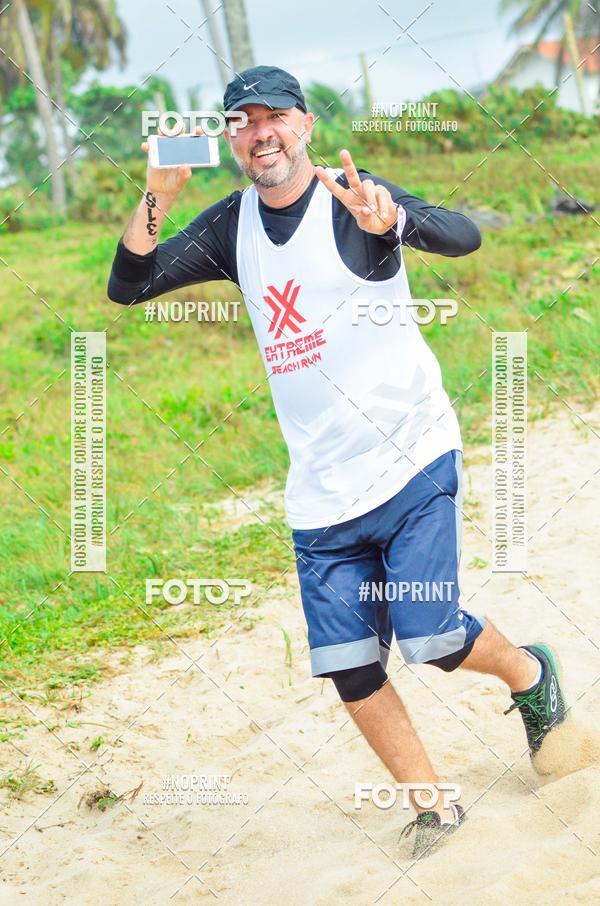 Achetez vos photos de l'vnementEXTREME BEACH RUN sur Fotop
