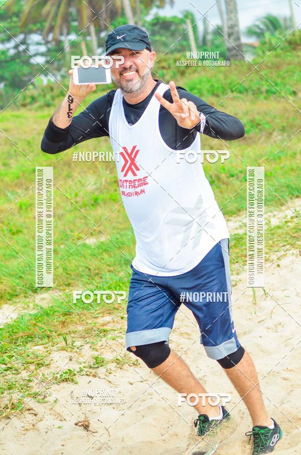 Achetez vos photos de l'vnementEXTREME BEACH RUN sur Fotop