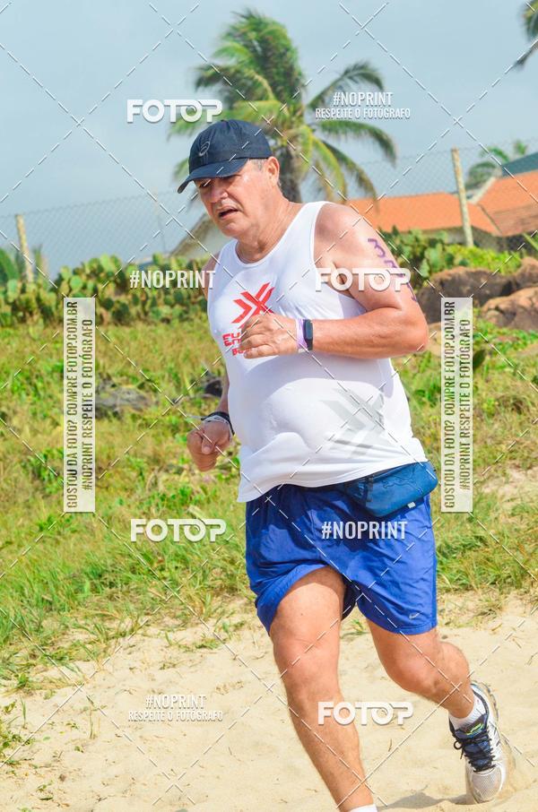 Achetez vos photos de l'vnementEXTREME BEACH RUN sur Fotop