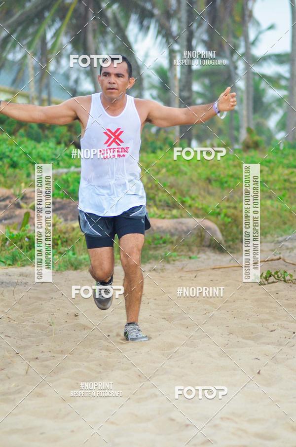 Achetez vos photos de l'vnementEXTREME BEACH RUN sur Fotop