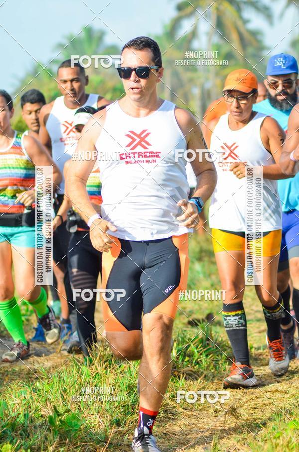 Achetez vos photos de l'vnementEXTREME BEACH RUN sur Fotop