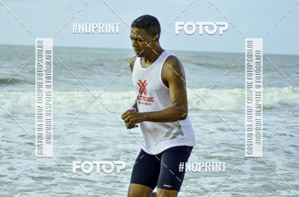 Buy your photos of the eventEXTREME BEACH RUN on Fotop