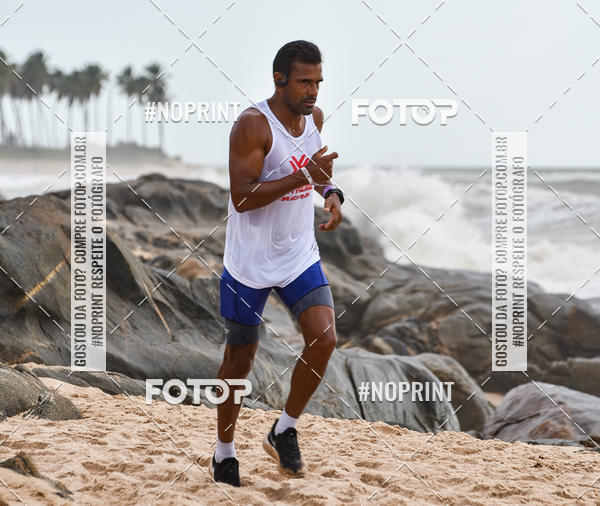 Achetez vos photos de l'vnementEXTREME BEACH RUN sur Fotop