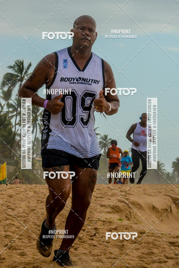 Achetez vos photos de l'vnementEXTREME BEACH RUN sur Fotop