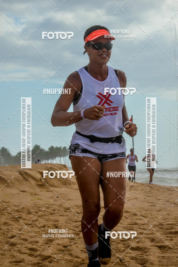 Achetez vos photos de l'vnementEXTREME BEACH RUN sur Fotop