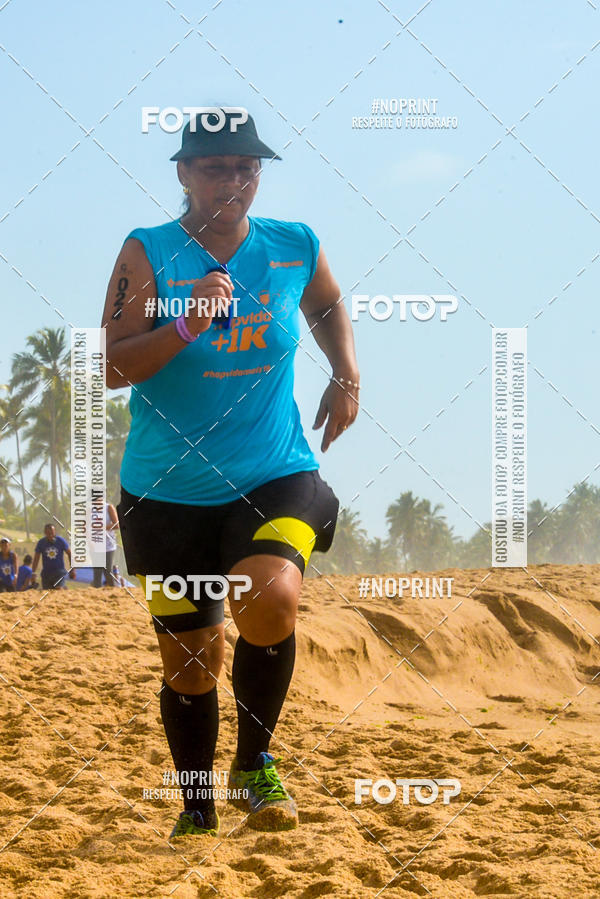Achetez vos photos de l'vnementEXTREME BEACH RUN sur Fotop