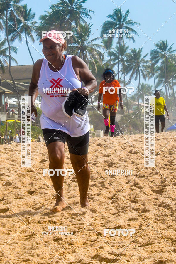Achetez vos photos de l'vnementEXTREME BEACH RUN sur Fotop