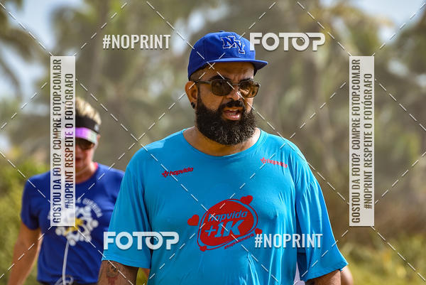 Achetez vos photos de l'vnementEXTREME BEACH RUN sur Fotop