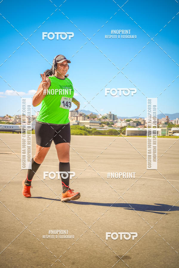 Compra tus fotos del eventoCorrida Hangar 942 En Fotop