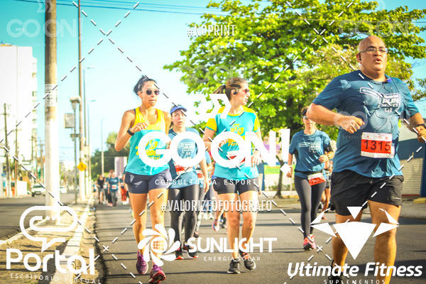 Buy your photos of the eventTrack e Field Run Series - SunRise on Fotop