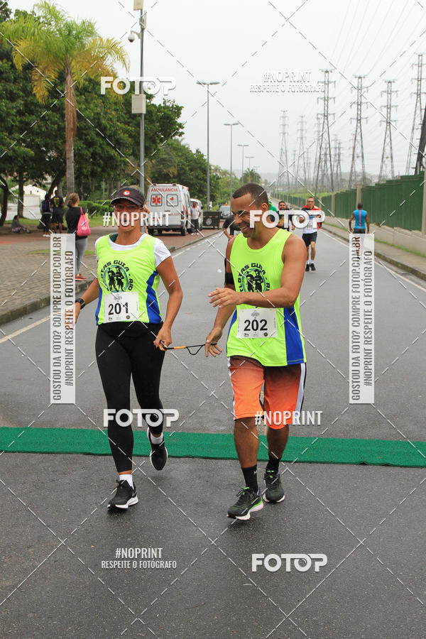 Buy your photos of the eventREI E RAINHA DO ASFALTO CORRIDA E CAMINHADA on Fotop