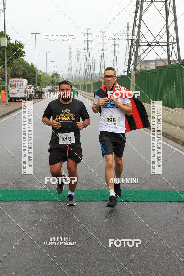 Buy your photos of the eventREI E RAINHA DO ASFALTO CORRIDA E CAMINHADA on Fotop