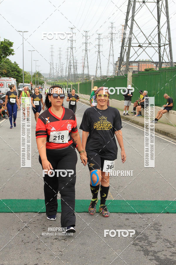 Buy your photos of the eventREI E RAINHA DO ASFALTO CORRIDA E CAMINHADA on Fotop