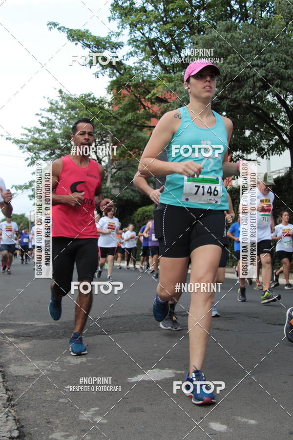 Compre suas fotos do evento6� Meia Maratona de Bauru no Fotop