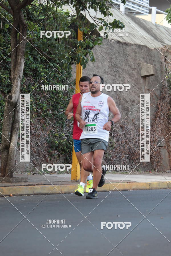 Compre suas fotos do evento6� Meia Maratona de Bauru no Fotop